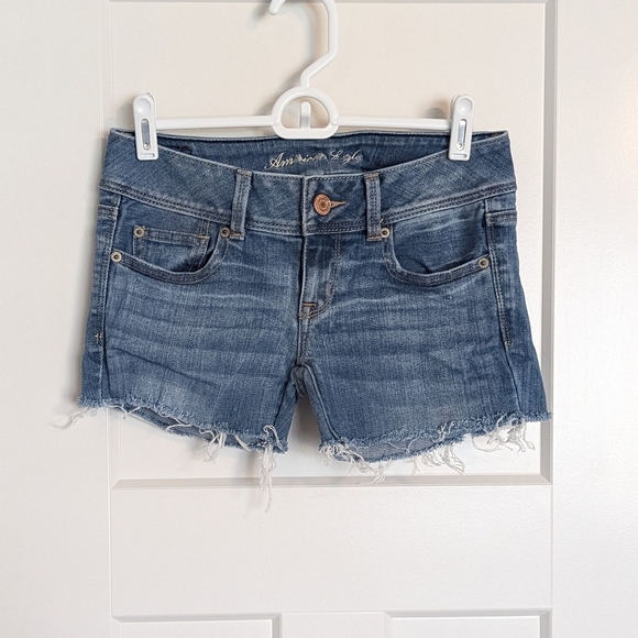 Y2K American Eagle Mid Rise Slim Boot Cut Off Jean Shorts sz 0 - Picture 1 of 7